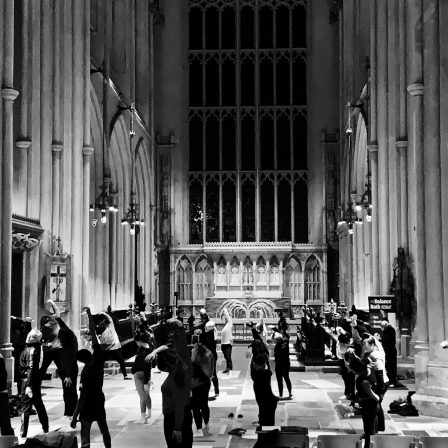 A group of people stretching in Bath Abbey